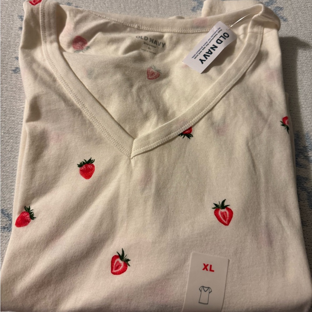 Get ready for strawberry season with this v-neck tee with cute strawberry print